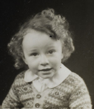 Mel when young, with curly hair